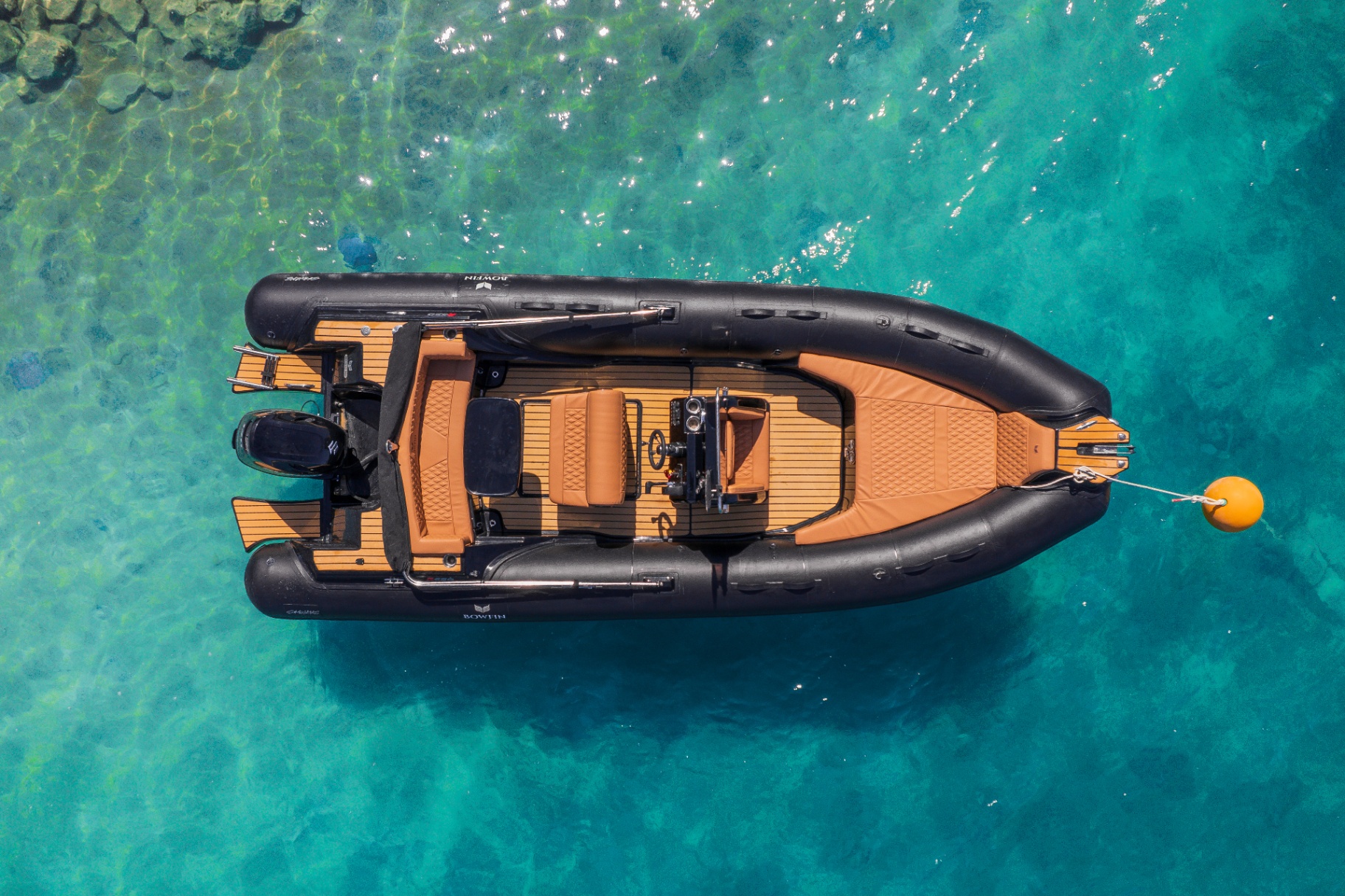 Aerial top-down of Bowfin R650 over coral reef